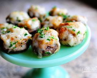 Шампиньоны под сыром в духовке