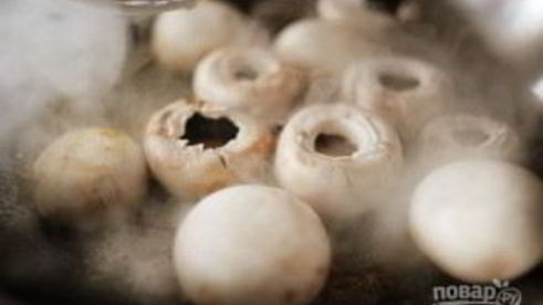 шампиньоны под сыром в духовке