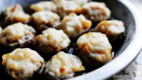 шампиньоны под сыром в духовке