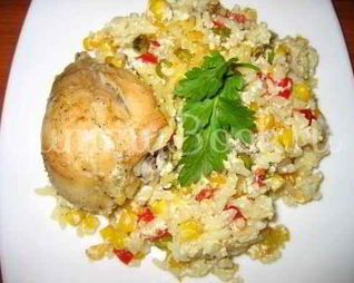 Курица, запеченная в духовке с рисом и овощами