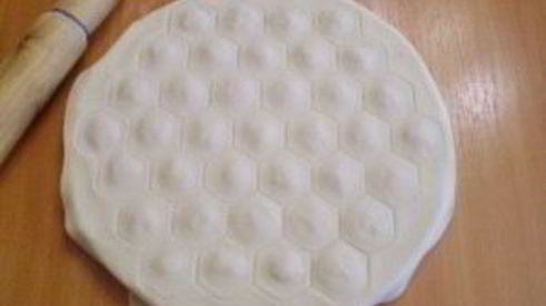 пельмени под соусом