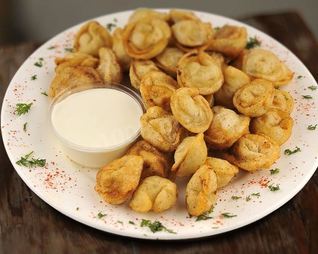 Замороженные жареные пельмени