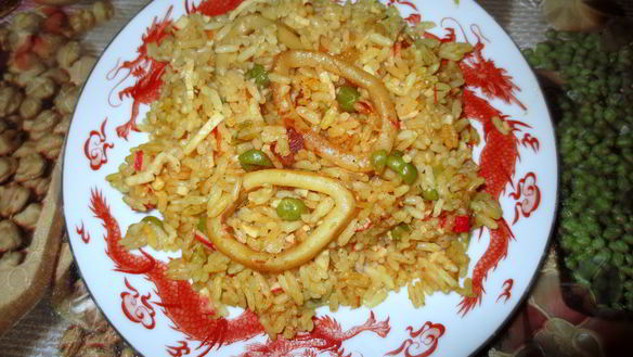 Рецепт Паэльи с кальмарами в пиве