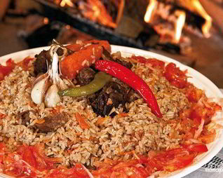 Плов в казане на плите