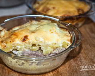 Картошка под шубой в духовке со свининой